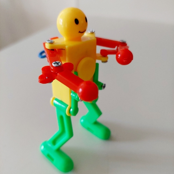 3.5" Fun Wind-up Dancing Walking Robot Toy Red Green and Yellow. Makes a great - Picture 2 of 11